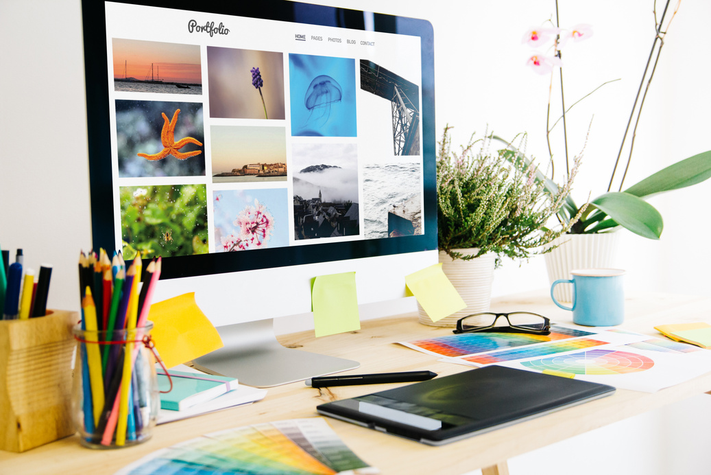 Computer with Online Portfolio on a Desk